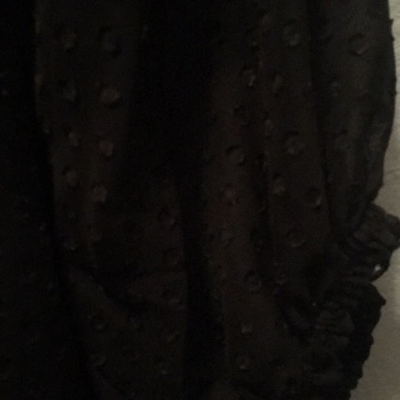 Black blouse with elastic button. - Picture 3 of 3